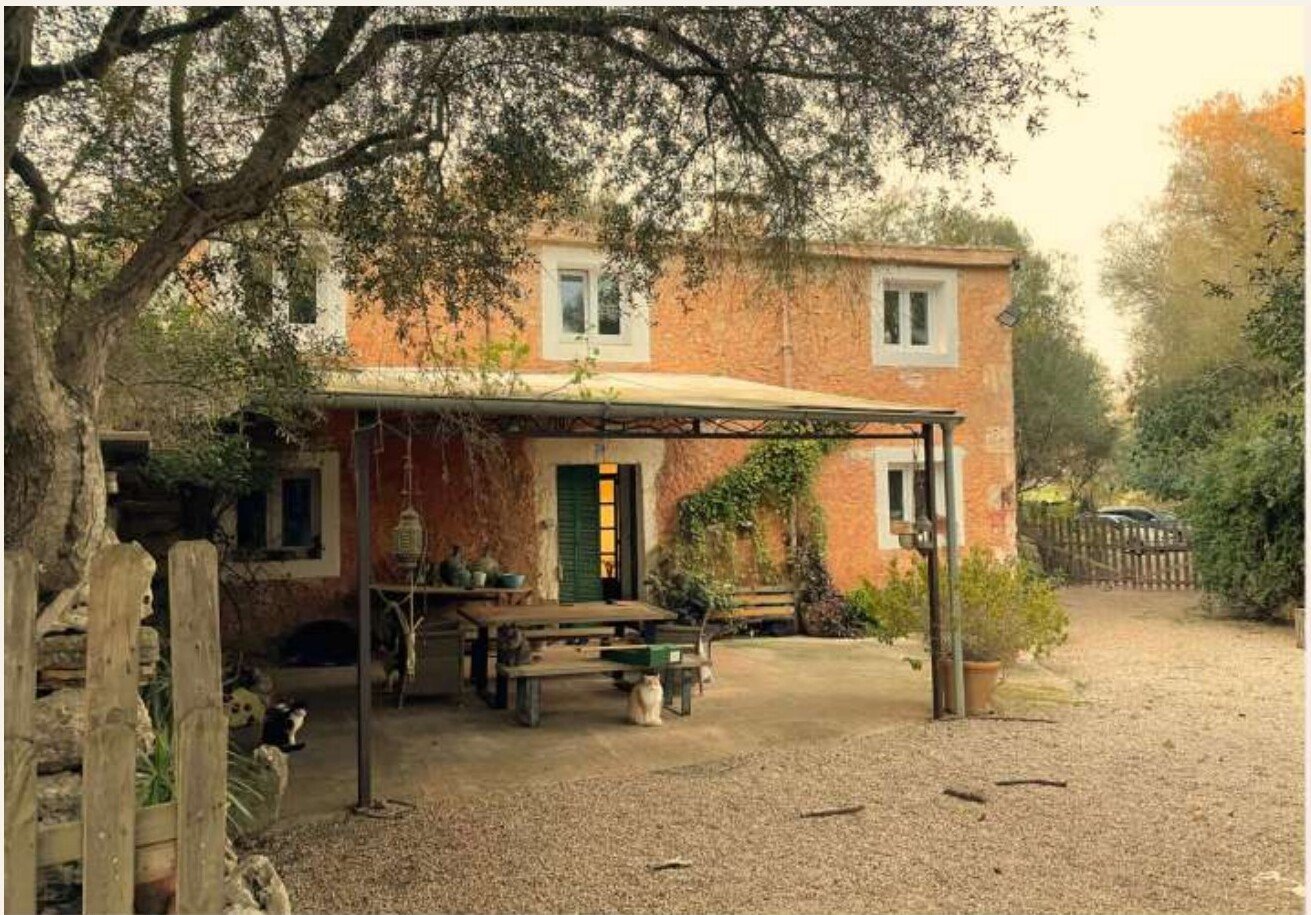 The stone finca building at Son Cavalls with its terrace